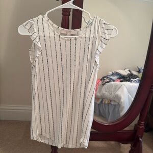 White and black top from Loft